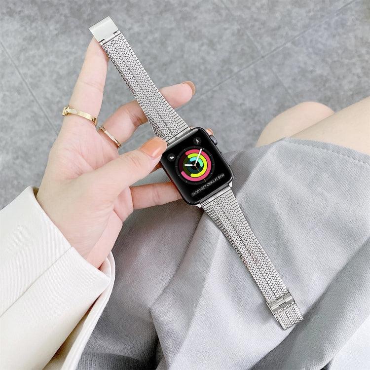apple watch steel replacement strap displayed on wrist with colorful watch face and elegant design.